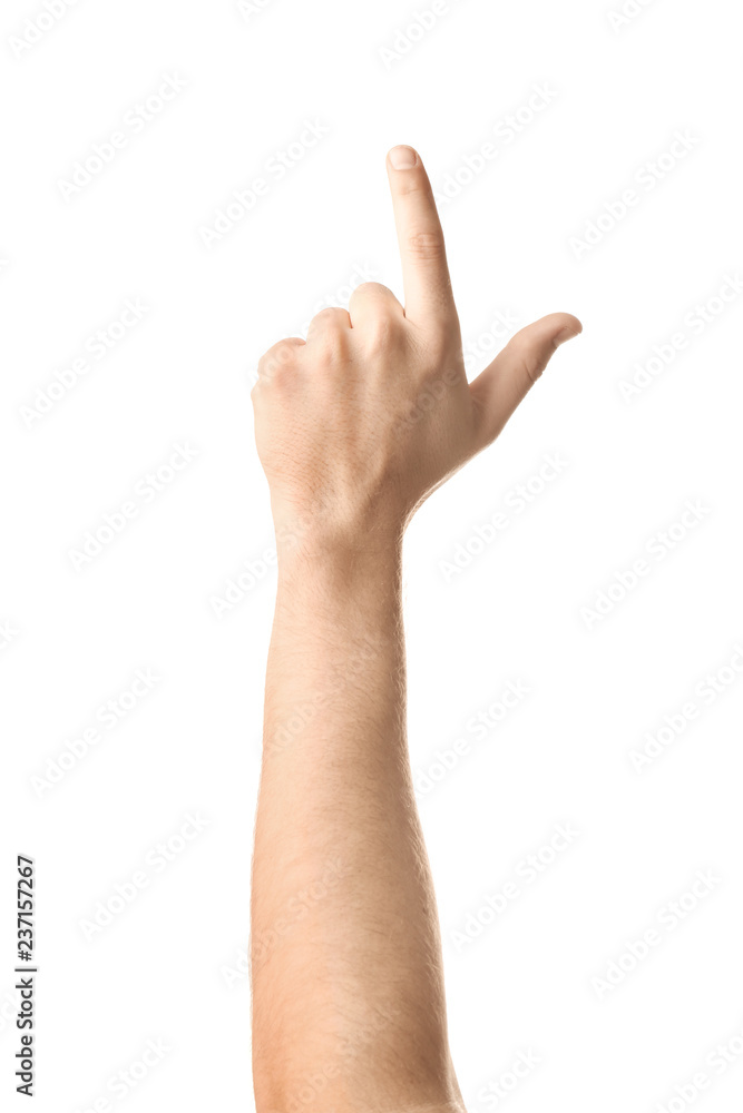 Male hand pointing at something on white background