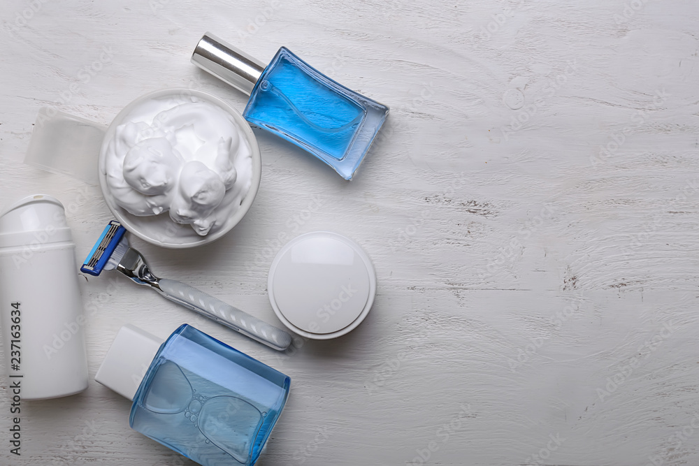 Shaving accessories on white wooden background, flat lay