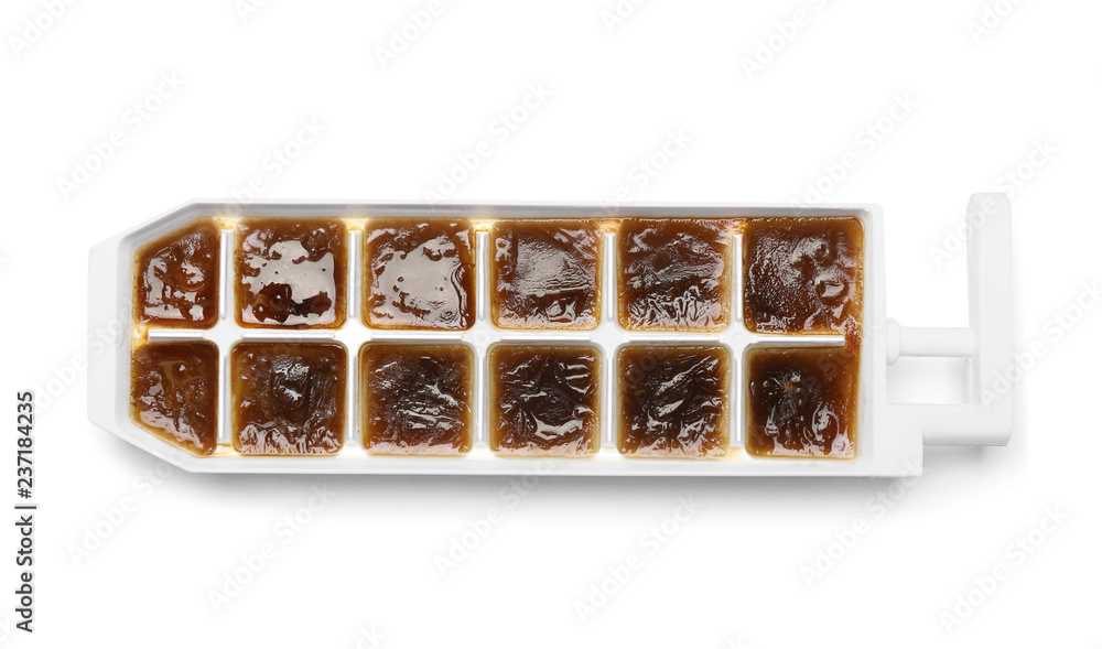 Coffee ice cubes in holder on white background