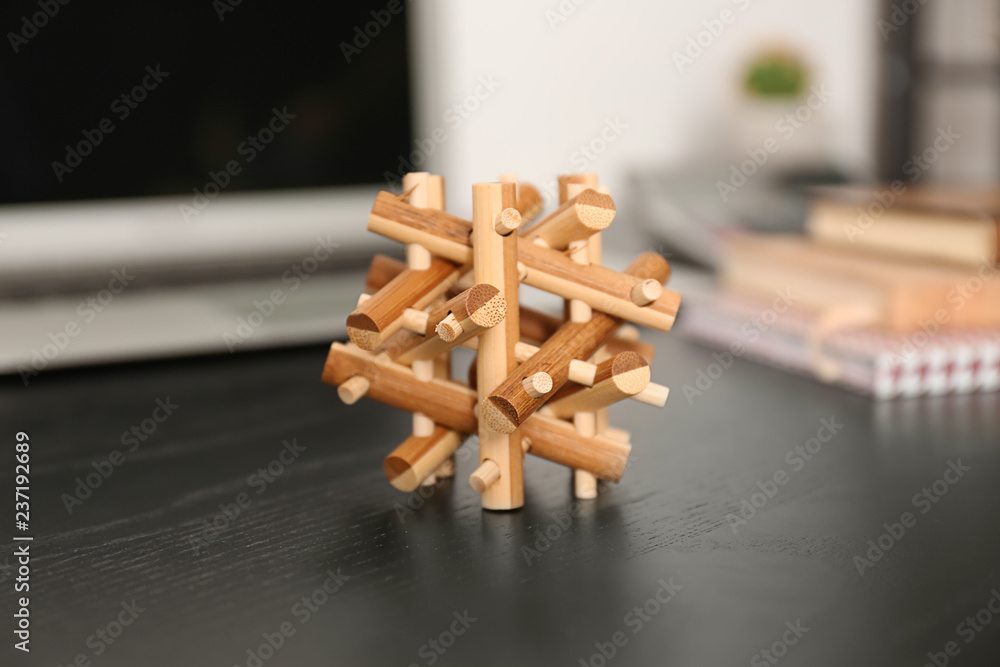 Wooden puzzle on table