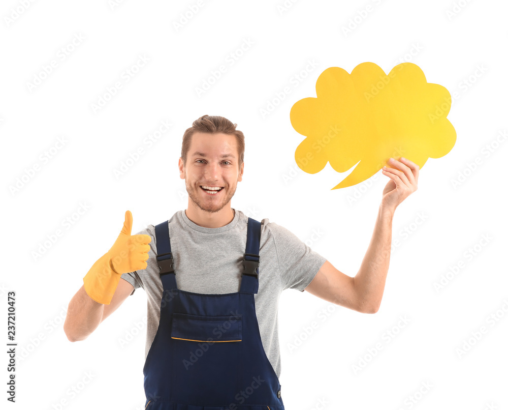 Young man holding blank speech bubble on white background