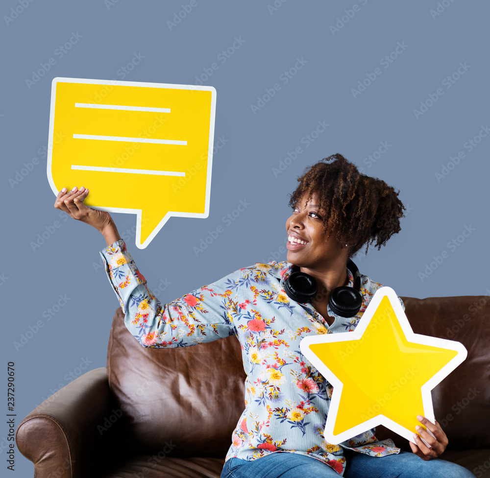 Cheerful woman holding a speech bubble and star icon