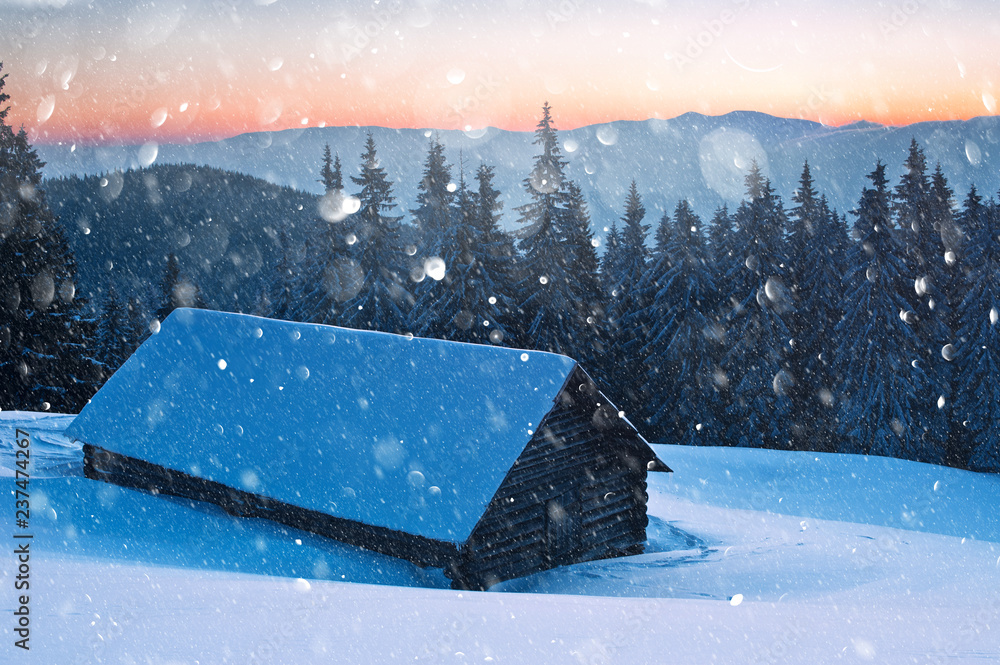 Fantastic winter landscape with wooden house in snowy mountains. Christmas holiday postcard collage.