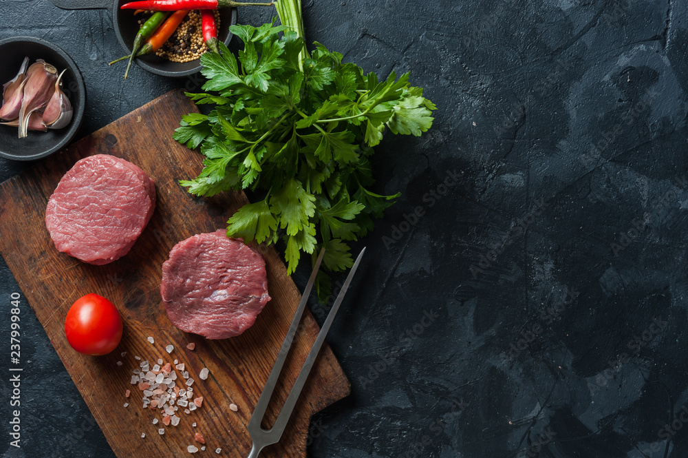 Steaks on cutting board