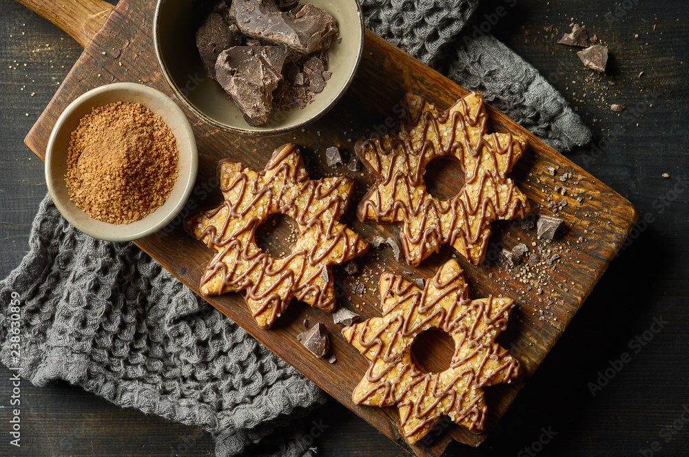 freshly baked cookies decorated with chocolate and sugar