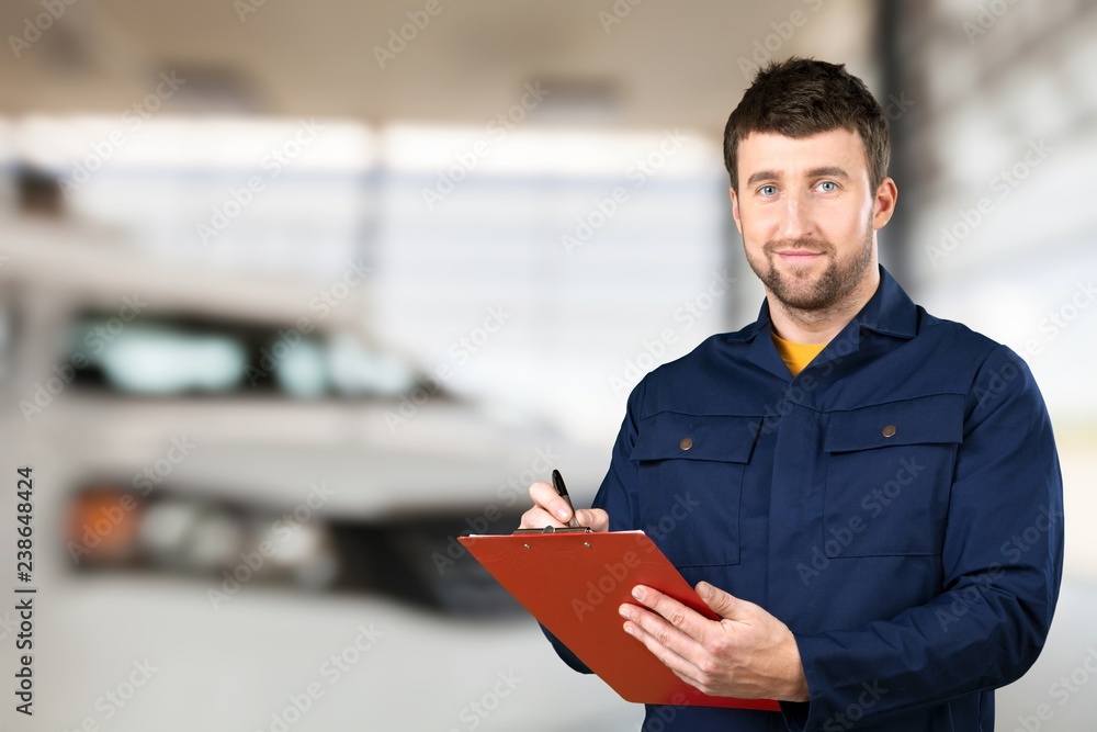 Auto Repair Shop, Male Mechanic near Car