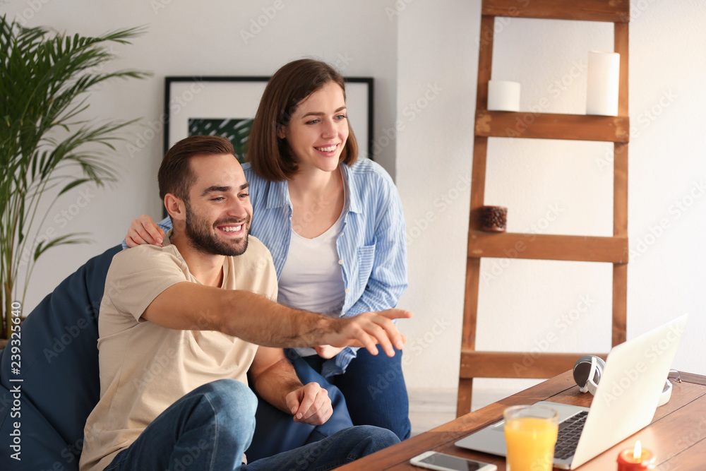 Happy young couple at home