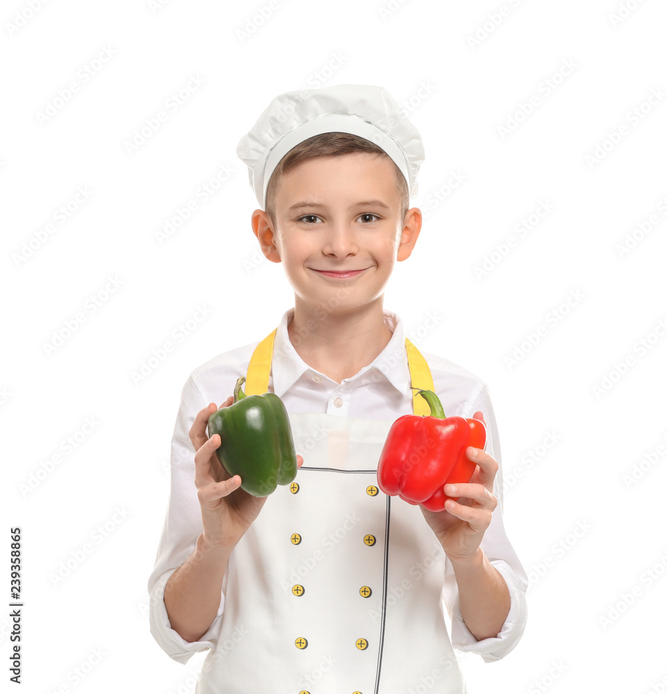 Cute little chef with peppers on white background