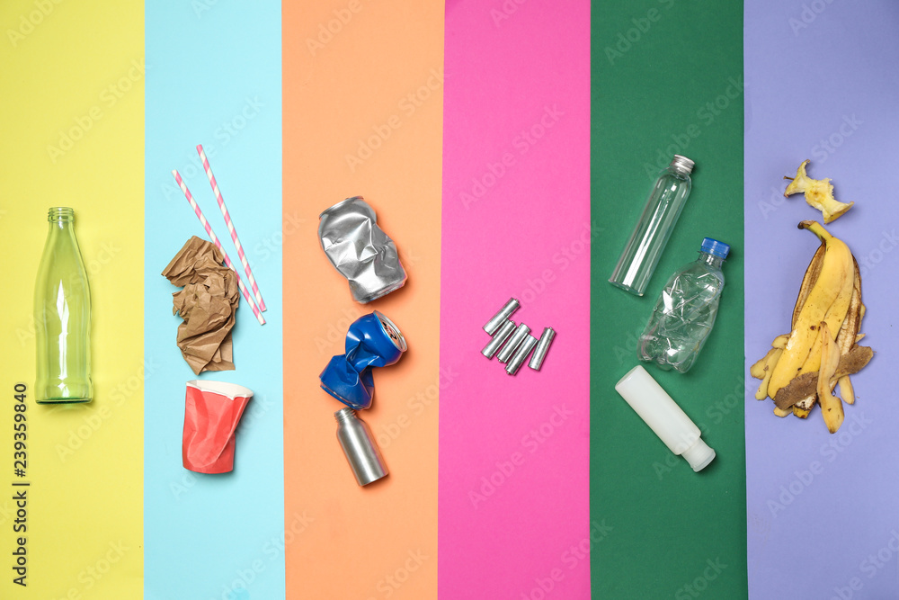 Different garbage on color background