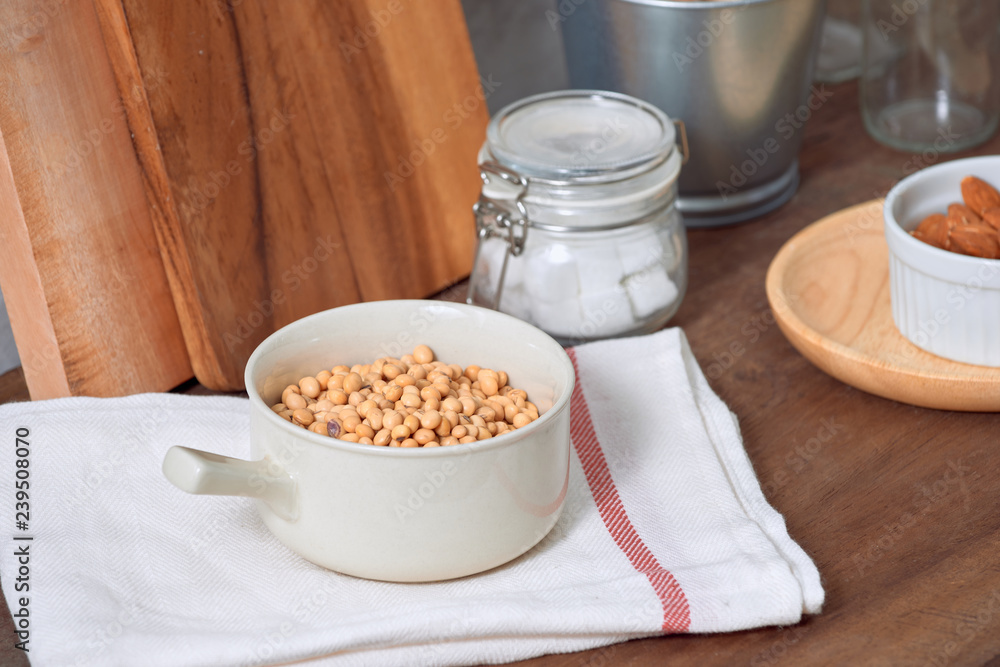 Kitchen still life with nuts and utensils