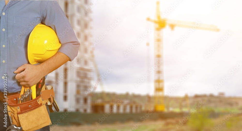 Worker with a tool belt. Isolated over white background.