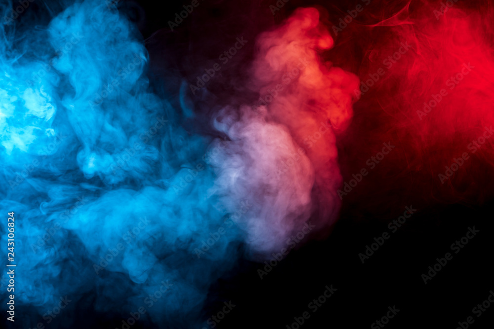 Clouds of isolated colored smoke: blue, red, orange, pink; scrolling on a black background in the da