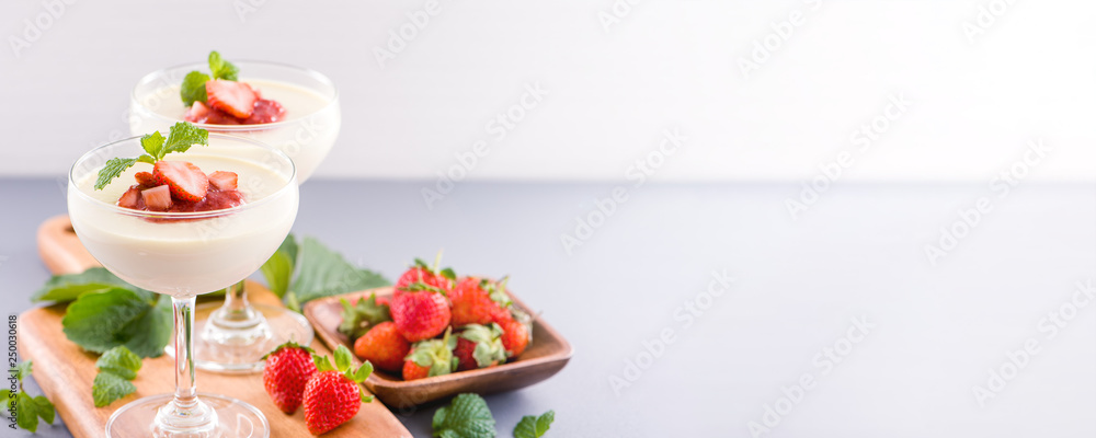 Delicous and nutritious double color (colour) strawberry desserts with mint and diced sarcocarp topp