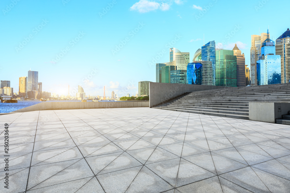 Empty square floor and financial district cityscape in Shanghai