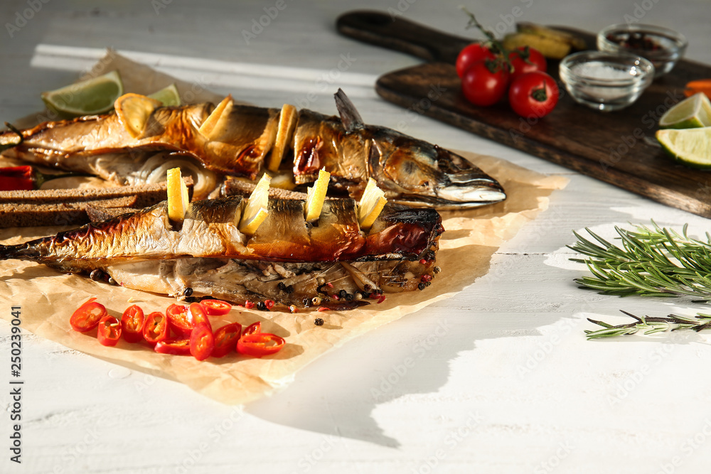 Tasty mackerel fish on white table