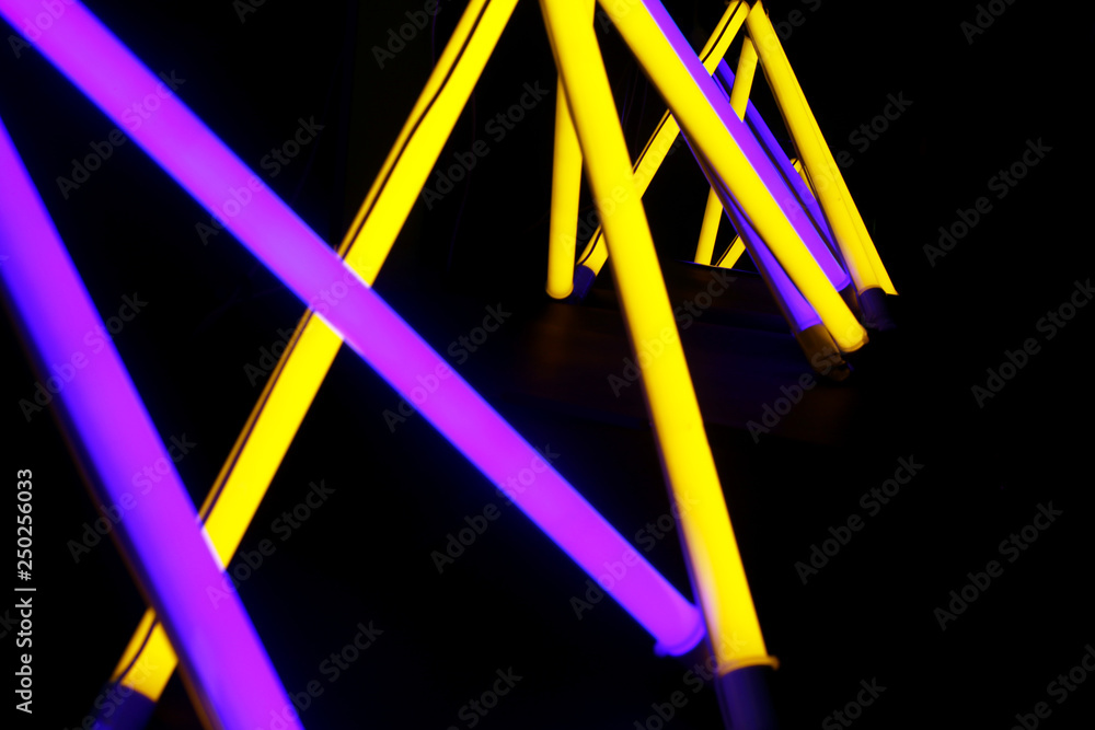 Bright neon lamps on dark background