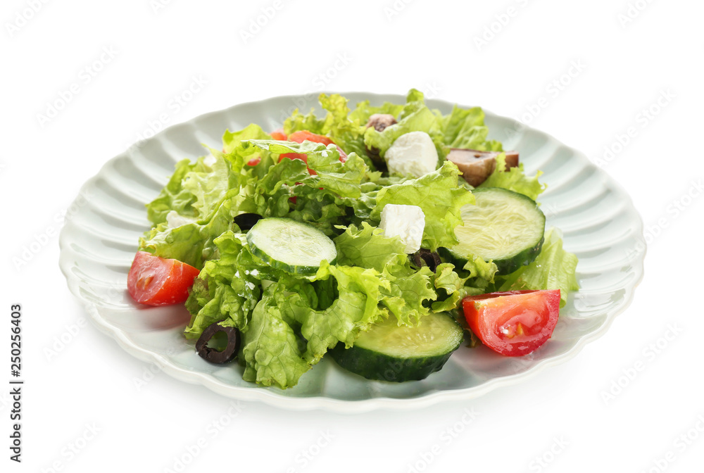 Plate with tasty fresh salad on white background