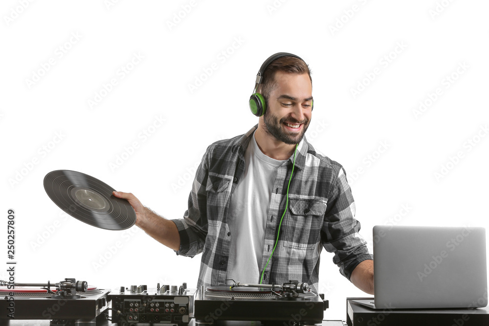 Male DJ playing music on white background