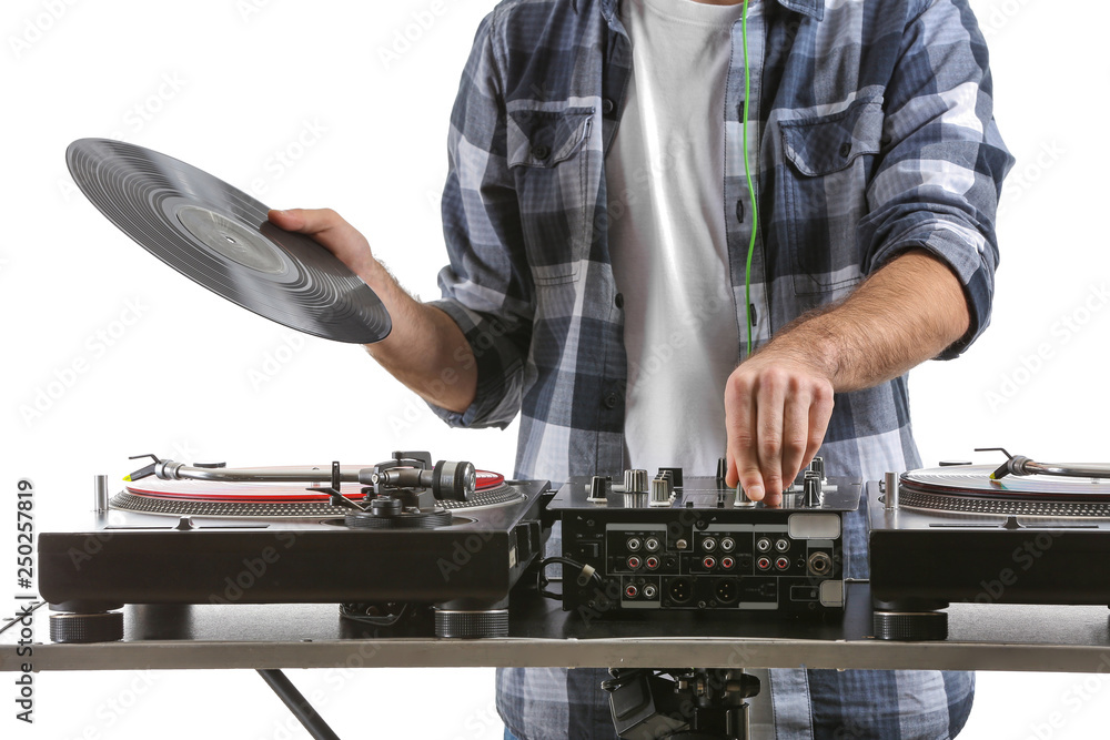 Male DJ playing music on white background