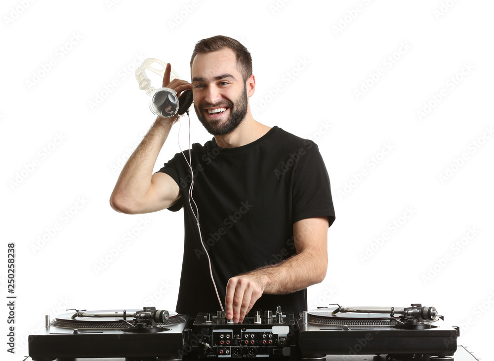 Male DJ playing music on white background