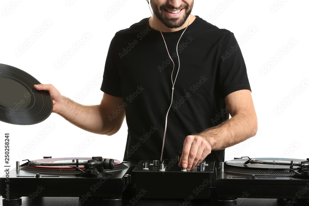 Male DJ playing music on white background