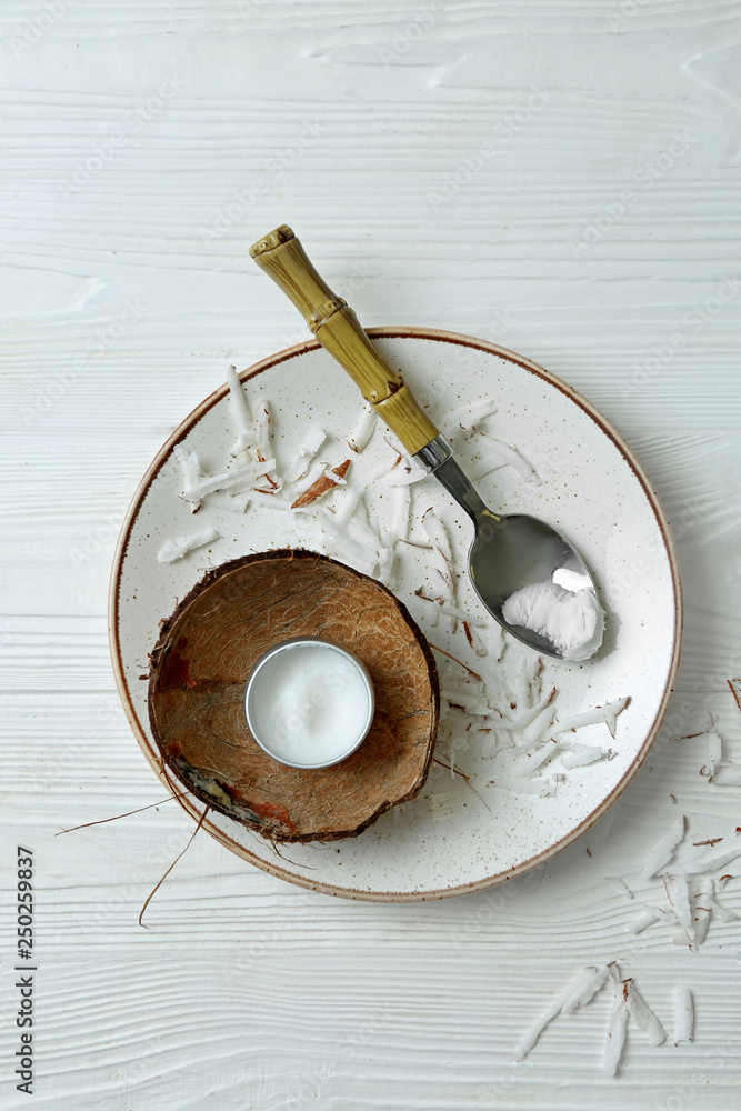 Cosmetics with natural ingredients on white wooden background