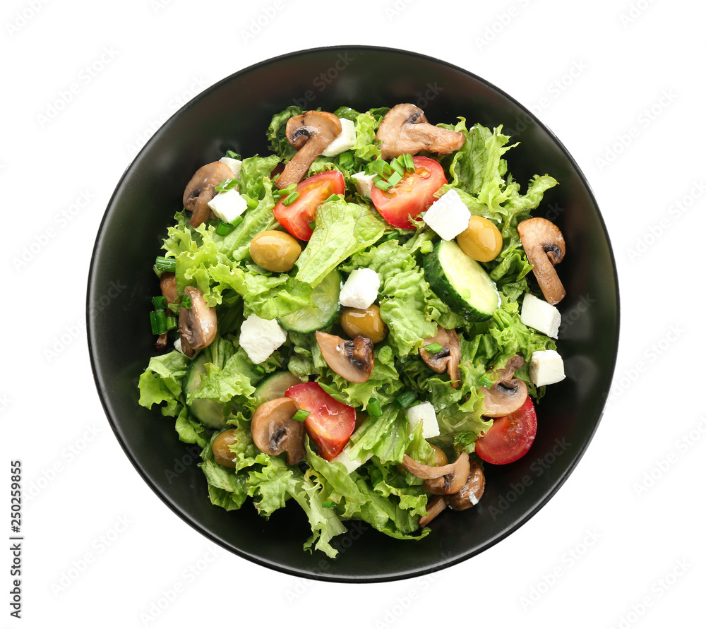 Plate with tasty fresh salad on white background