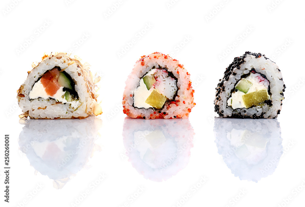 Tasty sushi rolls on white background