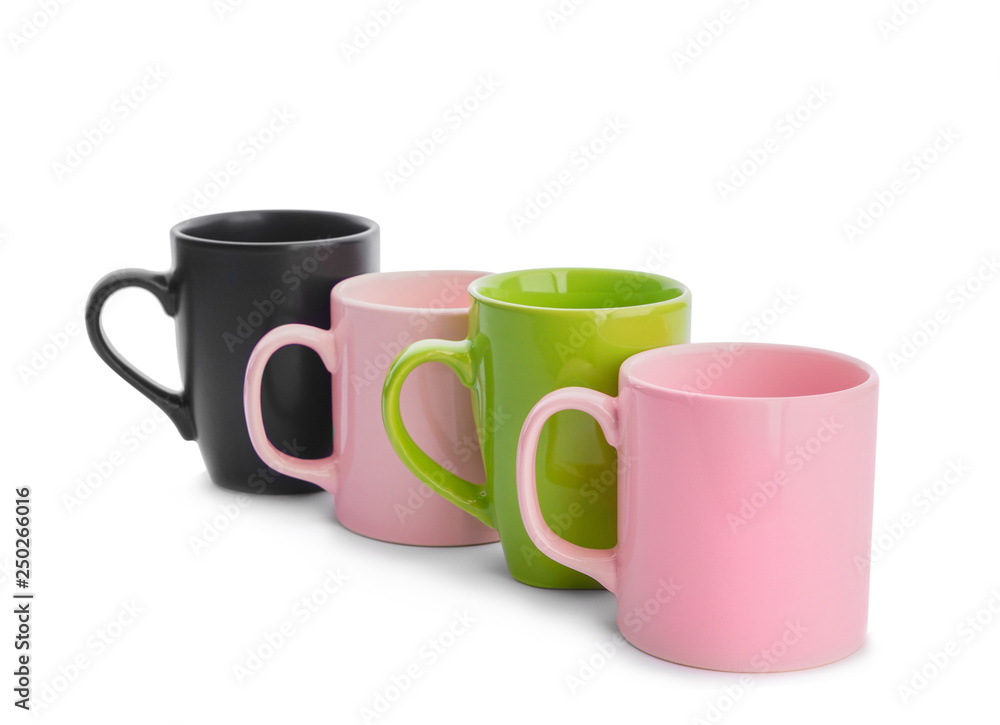 Colorful empty cups on white background