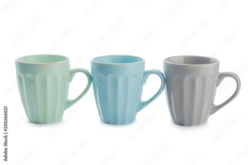 Colorful empty cups on white background