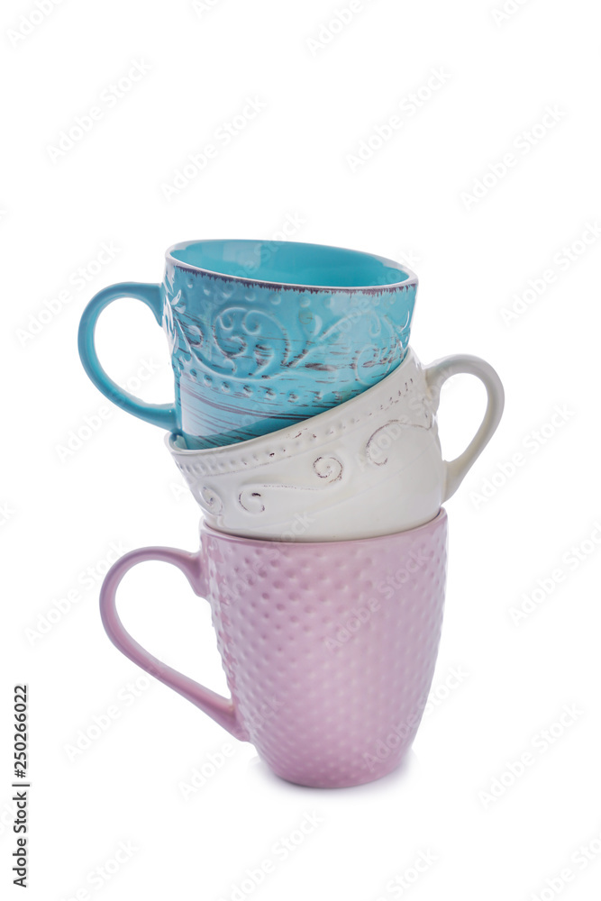 Colorful empty cups on white background