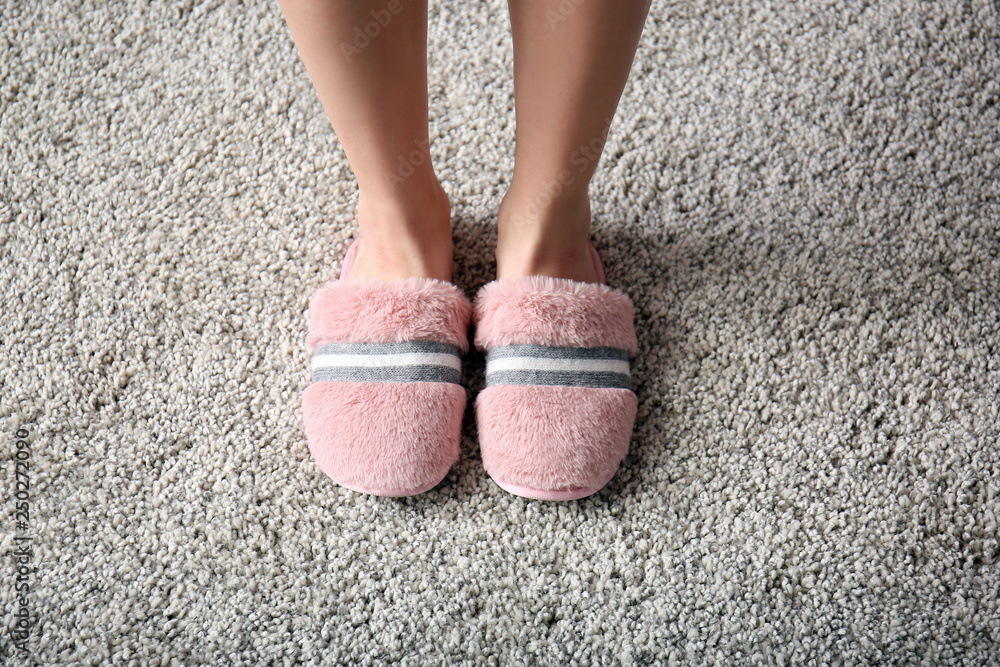 Woman in soft slippers at home