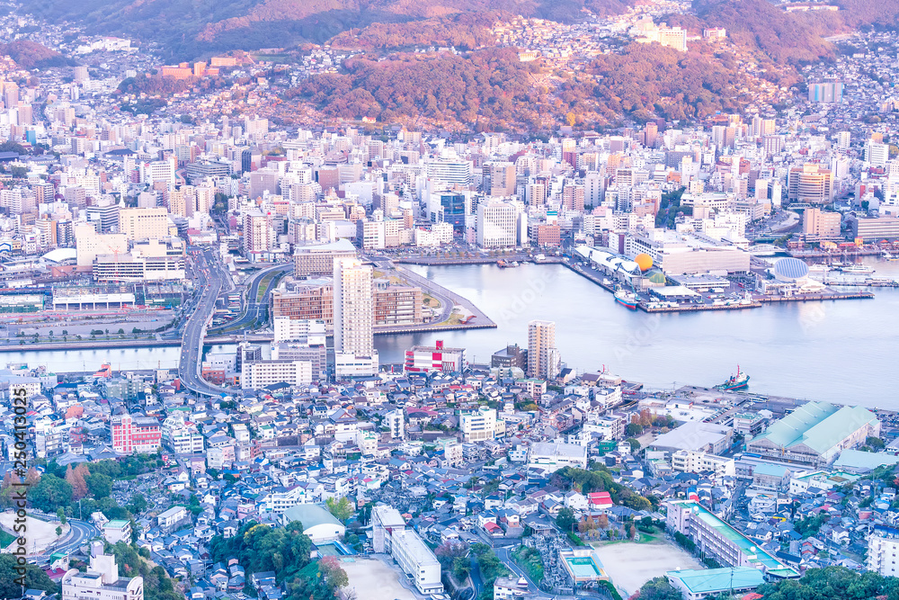 Business concept, modern cityscape of nagasaki dusk from mount inasa, the new top 3 nightview of the