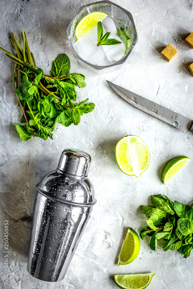 making mojito on stone background top view