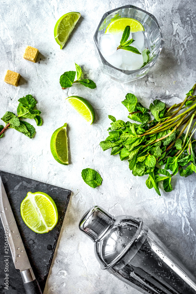 making mojito on stone background top view