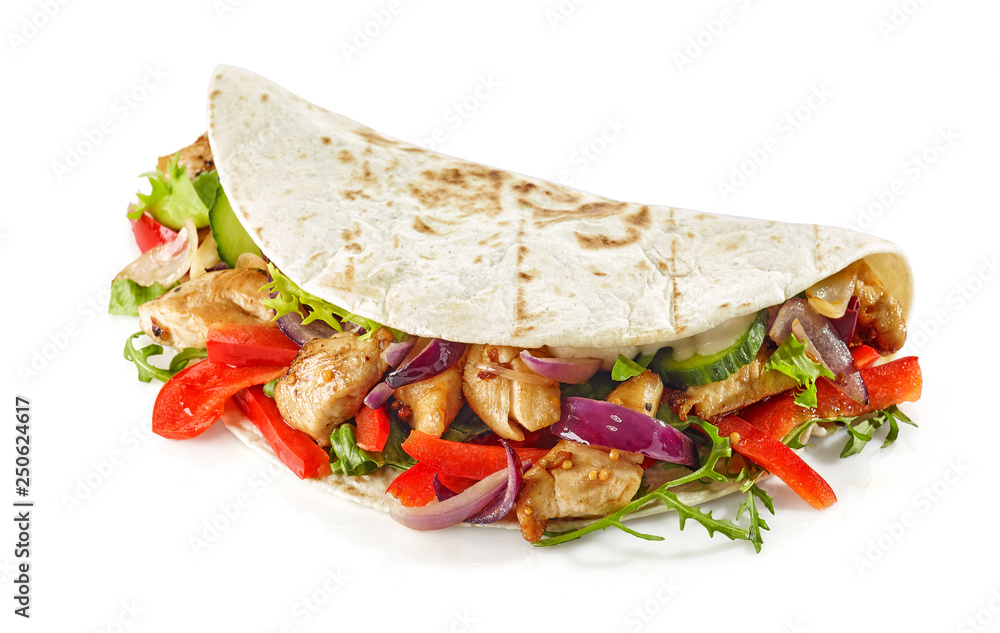 Tortilla wrap with fried chicken meat and vegetables