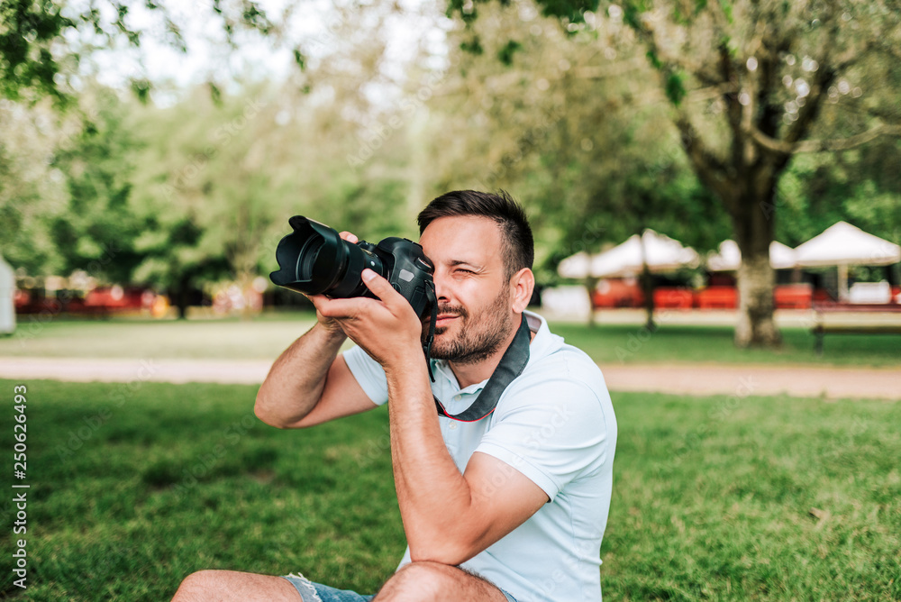 Close-up of photographer outdoors.