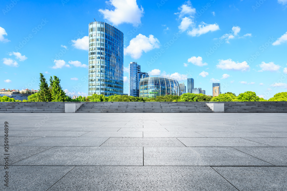 Empty square ground and modern commercial buildings in Shanghai