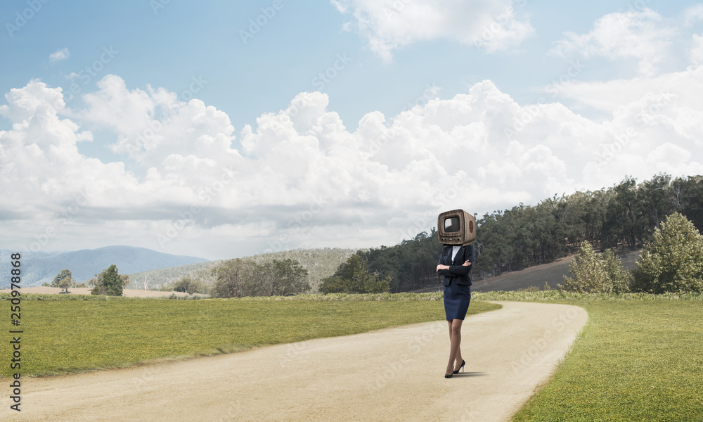 Business woman with an old TV instead of head.