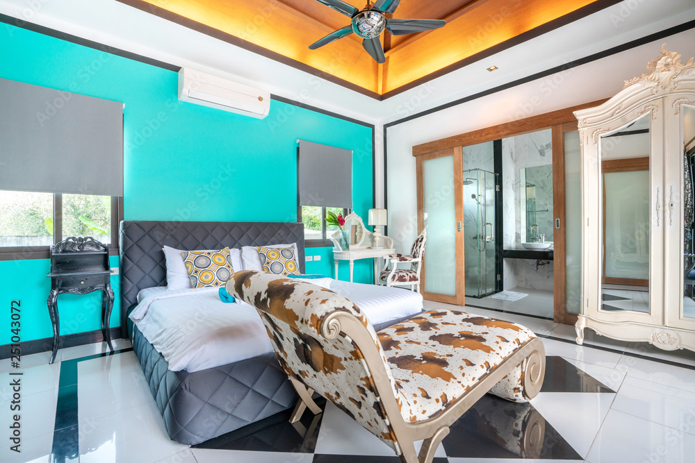 Luxury real Interior design in bedroom of pool villa with cozy king bed. with high raised ceiling  h