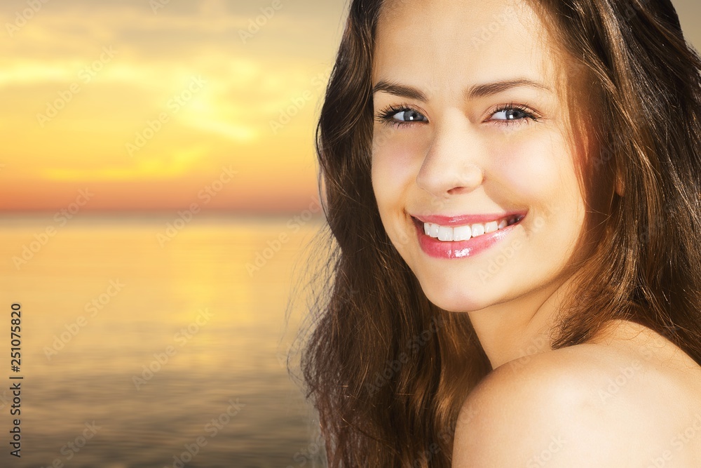 Outdoor summer portrait of pretty young smiling