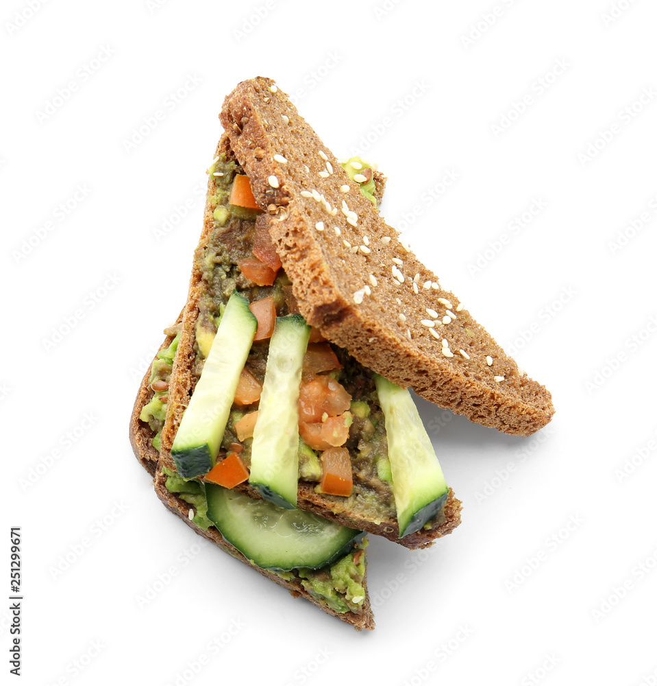 Tasty sandwich with avocado and vegetables on white background