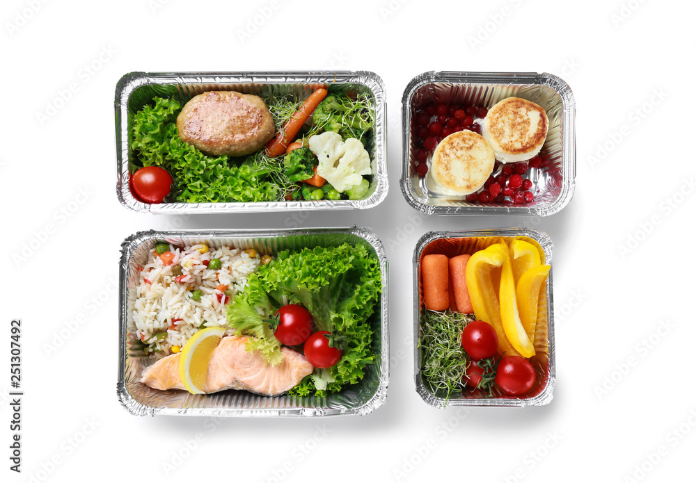 Containers with delicious food for delivery on white background