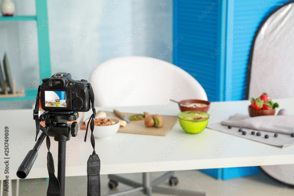 Workplace of food blogger with modern camera