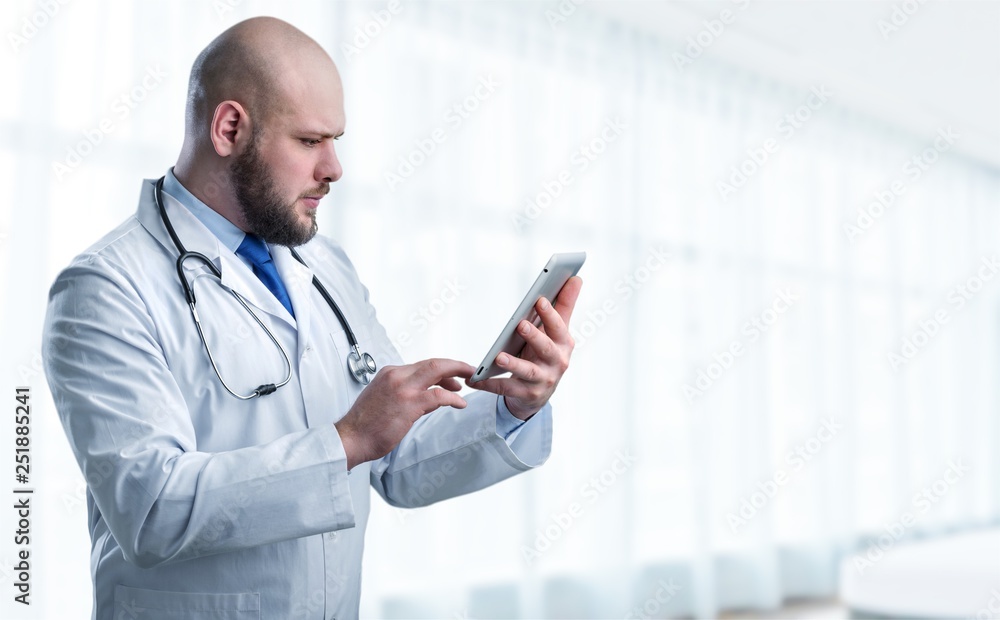 Close-up Doctor at hospital working with tablet pc