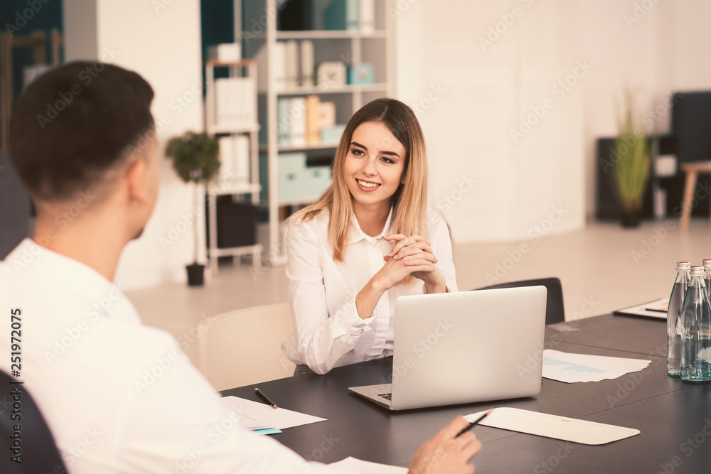 Colleagues working at business meeting