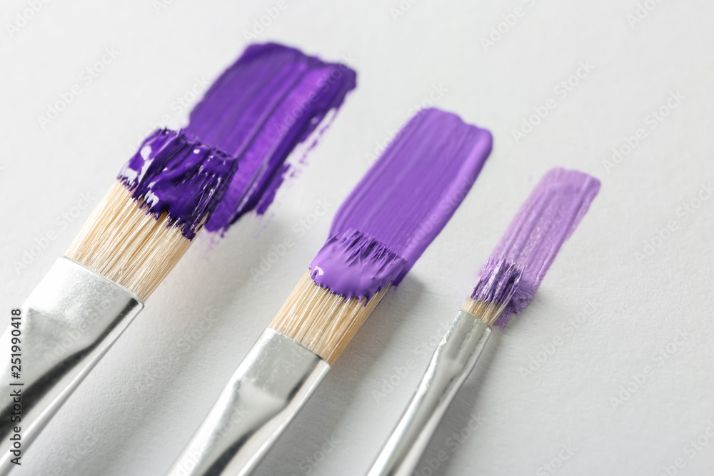 Set of paint brushes on white background