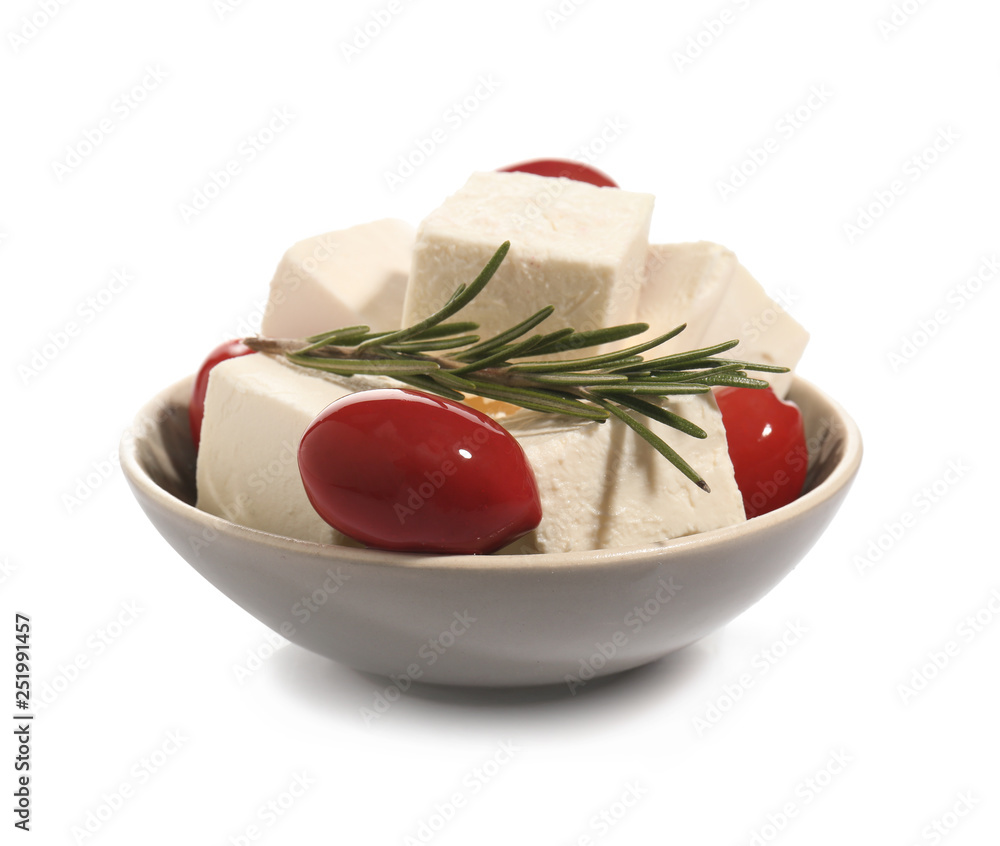 Bowl with tasty feta cheese and olives on white background