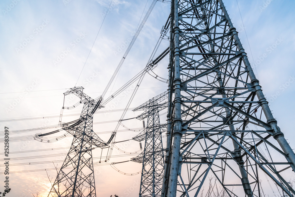 power transmission tower on background of blue sky