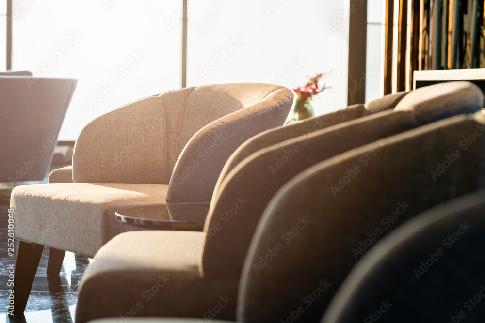 contemporary interior of Living room with part of sofa in sunny day and white curtain interior backg